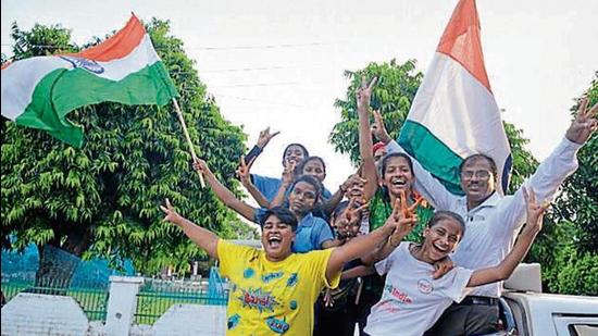 Sports enthusiasts take out a victory procession in Lucknow after India ended its hockey Olympic medal drought on Thursday. (Deepak Gupta/HT Photo)