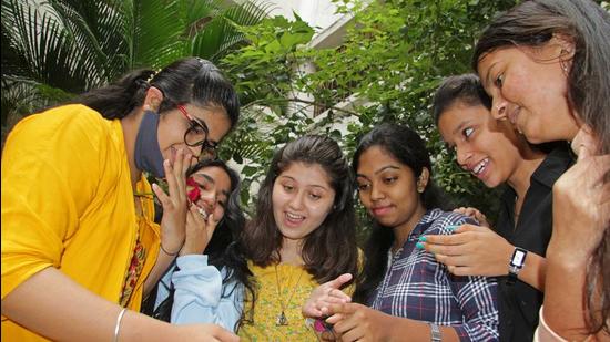 HSC students react after result in Pune. (Ravindra Joshi/HT PHOTO)