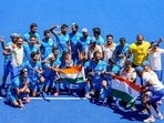 Indian players pose for group photographs as they celebrate their victory over Germany in the men's field hockey bronze medal match, at the 2020 Summer Olympics.(PTI) Indian players pose for group photographs as they celebrate their victory over Germany in the men's field hockey bronze medal match, at the 2020 Summer Olympics.(PTI)
