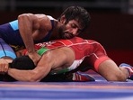 Morteza Ghiasi Cheka of Iran competes against Bajrang Punia of India. (Getty Images) Morteza Ghiasi Cheka of Iran competes against Bajrang Punia of India. (Getty Images)