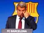 FC Barcelona club President Joan Laporta scratches his face during a news conference in Barcelona, Spain, Friday, Aug. 6, 2021. Barcelona announced on Thursday, Aug. 5, 2021 that Lionel Messi will not stay with the club. He is leaving after 17 successful seasons in which he propelled the Catalan club to glory, helping it win numerous domestic and international titles since debuting as a teenager. FC Barcelona club President Joan Laporta scratches his face during a news conference in Barcelona, Spain, Friday, Aug. 6, 2021. Barcelona announced on Thursday, Aug. 5, 2021 that Lionel Messi will not stay with the club. He is leaving after 17 successful seasons in which he propelled the Catalan club to glory, helping it win numerous domestic and international titles since debuting as a teenager.