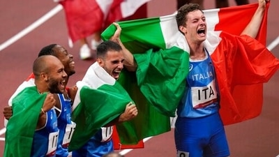 From left: Filippo Tortu, Lorenzo Patta, Eseosa Desalu and Lamont Jacobs, of Italy celebrate after taking the gold medal in the final of the men's 4 x 100-meter relay at the 2020 Summer Olympics, Friday, Aug. 6, 2021, in Tokyo, Japan. (AP) From left: Filippo Tortu, Lorenzo Patta, Eseosa Desalu and Lamont Jacobs, of Italy celebrate after taking the gold medal in the final of the men's 4 x 100-meter relay at the 2020 Summer Olympics, Friday, Aug. 6, 2021, in Tokyo, Japan. (AP)