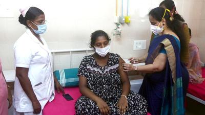 Tamil Nadu, June 16 (ANI): A healthcare worker inoculates a mother of a newborn child with COVID-19 vaccine at a government Children Hospital, in Chennai on Wednesday. (ANI Photo) (ANI)