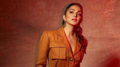 Kiara exuded girl boss vibes in her highly structured suit along with large statement earrings and glossy, dewy make-up look. (Instagram) Kiara exuded girl boss vibes in her highly structured suit along with large statement earrings and glossy, dewy make-up look. (Instagram)