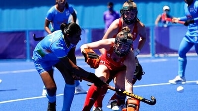 India's Navneet Kaur, left, attacks against Britain's Shona McCallin during the women's field hockey bronze medal match at the 2020 Summer Olympics, Friday, Aug. 6, 2021, in Tokyo, Japan. (AP Photo/John Locher) (AP) India's Navneet Kaur, left, attacks against Britain's Shona McCallin during the women's field hockey bronze medal match at the 2020 Summer Olympics, Friday, Aug. 6, 2021, in Tokyo, Japan. (AP Photo/John Locher) (AP)