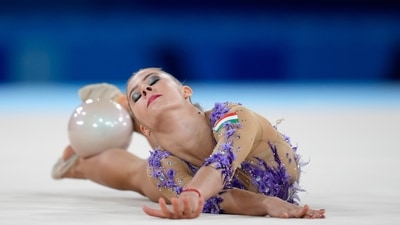 Fanni Pigniczki, of Hungary, performs during the rhythmic gymnastics individual all-around qualifier at the 2020 Summer Olympics, Friday, Aug. 6, 2021, in Tokyo, Japan. (AP Photo/Natacha Pisarenko) (AP) Fanni Pigniczki, of Hungary, performs during the rhythmic gymnastics individual all-around qualifier at the 2020 Summer Olympics, Friday, Aug. 6, 2021, in Tokyo, Japan. (AP Photo/Natacha Pisarenko) (AP)