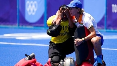 India's goalkeeper Savita, left, is comforted by assistant coach Johnna Dorothea Maria Schopman after India lost 4-3 to Britain during the women's field hockey bronze medal match at the 2020 Summer Olympics, Friday, Aug. 6, 2021, in Tokyo, Japan. (AP Photo/John Locher) (AP) India's goalkeeper Savita, left, is comforted by assistant coach Johnna Dorothea Maria Schopman after India lost 4-3 to Britain during the women's field hockey bronze medal match at the 2020 Summer Olympics, Friday, Aug. 6, 2021, in Tokyo, Japan. (AP Photo/John Locher) (AP)