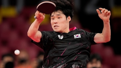 South Korea's Jang Woo-jin competes during the table tennis men's team bronze medal match against Japan's Jun Mizutani at the 2020 Summer Olympics, Friday, Aug. 6, 2021, in Tokyo. (AP Photo/Kin Cheung) (AP) South Korea's Jang Woo-jin competes during the table tennis men's team bronze medal match against Japan's Jun Mizutani at the 2020 Summer Olympics, Friday, Aug. 6, 2021, in Tokyo. (AP Photo/Kin Cheung) (AP)