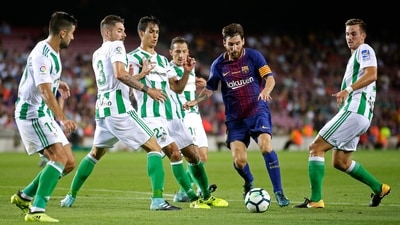 FILE - Lionel Messi, second right, in action during the Spanish La Liga soccer match between FC Barcelona and Betis at the Camp Nou stadium. (AP) FILE - Lionel Messi, second right, in action during the Spanish La Liga soccer match between FC Barcelona and Betis at the Camp Nou stadium. (AP)