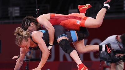 Japan's Risako Kawai (red) wrestles Belarus' Iryna Kurachkina in their women's freestyle 57kg wrestling final match during the Tokyo 2020 Olympic Games at the Makuhari Messe in Tokyo on August 5, 2021. (Photo by Jack GUEZ / AFP) (AFP) Japan's Risako Kawai (red) wrestles Belarus' Iryna Kurachkina in their women's freestyle 57kg wrestling final match during the Tokyo 2020 Olympic Games at the Makuhari Messe in Tokyo on August 5, 2021. (Photo by Jack GUEZ / AFP) (AFP)