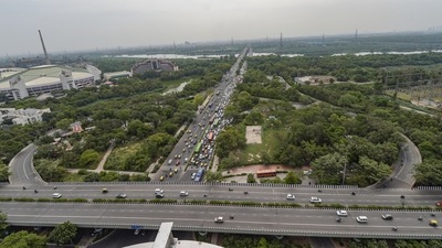 : An aerial view of traffic on the Vikas Marg - Ring Road crossing during morning rush-hour, after further ease in COVID-19 lockdown restrictions, in New Delhi. (PTI Photo) : An aerial view of traffic on the Vikas Marg - Ring Road crossing during morning rush-hour, after further ease in COVID-19 lockdown restrictions, in New Delhi. (PTI Photo)
