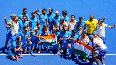 Indian players pose for group photographs as they celebrate their victory over Germany in the men's field hockey bronze medal match, at the 2020 Summer Olympics. (PTI) Indian players pose for group photographs as they celebrate their victory over Germany in the men's field hockey bronze medal match, at the 2020 Summer Olympics. (PTI)