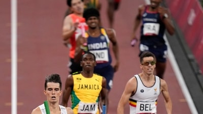 Kajetan Duszynski of Poland anchors his team to win a semifinal of the men's 4 x 400-meter relay at the 2020 Summer Olympics, Friday, Aug. 6, 2021, in Tokyo, Japan. (AP Photo/Francisco Seco) (AP) Kajetan Duszynski of Poland anchors his team to win a semifinal of the men's 4 x 400-meter relay at the 2020 Summer Olympics, Friday, Aug. 6, 2021, in Tokyo, Japan. (AP Photo/Francisco Seco) (AP)