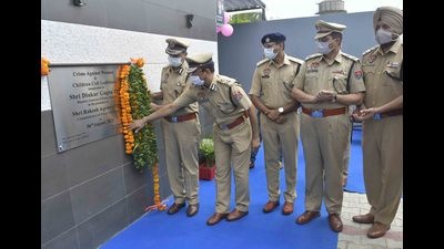 Punjab director general of police Dinkar Gupta inaugurating the new building for the centre for crime against women and children in Rishi Nagar, Ludhiana, on Friday. (HT photo)
