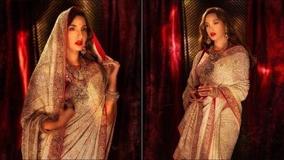 The saree is credited to Indian fashion designer Anjul Bhandari’s eponymous clothing label that is based out of New Delhi boasts of re-imagining the traditional embroideries from Awadh, namely Chikankari and Mukaish, in bridal fashion through elegant and classic aesthetic and the use of her signature pastel hues. (Instagram/manekaharisinghani)