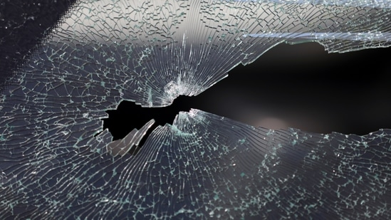 A bullet hole is seen on the window glass of a car in which director of Afghanistan’s information media centre, Dawa Khan Menapal, was seated when he was shot dead in Kabul on Friday.(AP)