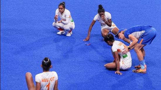 Indian players react after losing 1-2 against Argentina during women's field hockey semifinal match, at the 2020 Olympics in Tokyo on August 4. (PTI)