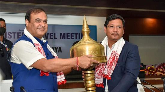 Meghalaya chief minister Conrad Sangma being felicitated by Assam chief minister Himanta Biswa Sarmah at a meeting on Assam -Meghalaya border in Guwahati on Friday. (PTI) Meghalaya chief minister Conrad Sangma being felicitated by Assam chief minister Himanta Biswa Sarmah at a meeting on Assam -Meghalaya border in Guwahati on Friday. (PTI)