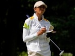 Aditi Ashok, of India, writes on her scorecard on the third hole during the final round of the women's golf event at the 2020 Tokyo Olympics(AP) Aditi Ashok, of India, writes on her scorecard on the third hole during the final round of the women's golf event at the 2020 Tokyo Olympics(AP)