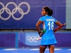 India's Vandana Katariya watches the replay board during a women's field hockey match against Germany at the 2020 Summer Olympics. 