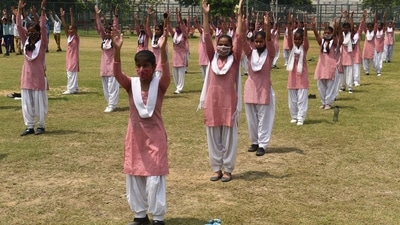 Girl students at a rehearsal for the Independence Day Celebration function at Nehru Stadium, in Gurugram. ( Vipin Kumar/Hindustan Times)