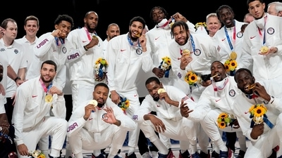 The U.S. men's basketball team poses for photos with their gold medals during the medal ceremony at the 2020 Summer Olympics, Saturday, Aug. 7, 2021, in Tokyo, Japan. (AP Photo/Eric Gay) (AP) The U.S. men's basketball team poses for photos with their gold medals during the medal ceremony at the 2020 Summer Olympics, Saturday, Aug. 7, 2021, in Tokyo, Japan. (AP Photo/Eric Gay) (AP)