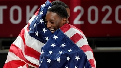 United States' Bam Adebayo (13), right, hugs teammate Kevin Durant (7) to celebrate after their win in the men's basketball gold medal game against France at the 2020 Summer Olympics, Saturday, Aug. 7, 2021, in Saitama, Japan. (AP Photo/Luca Bruno) (AP) United States' Bam Adebayo (13), right, hugs teammate Kevin Durant (7) to celebrate after their win in the men's basketball gold medal game against France at the 2020 Summer Olympics, Saturday, Aug. 7, 2021, in Saitama, Japan. (AP Photo/Luca Bruno) (AP)