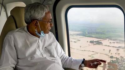 Bihar chief minister Nitish Kumar conducts aerial survey of flood affected areas. (PTI) Bihar chief minister Nitish Kumar conducts aerial survey of flood affected areas. (PTI)