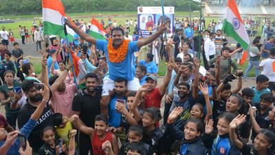 Naseem Ahmad, who coached Neeraj Chopra at Tau Devi Lal Stadium, celebrating in Panchkula on Saturday. (Sant Arora/HT) Naseem Ahmad, who coached Neeraj Chopra at Tau Devi Lal Stadium, celebrating in Panchkula on Saturday. (Sant Arora/HT)