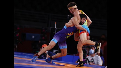 Wrestlers Ravi Kumar Dahiya of India and Nurislam Sanayev of Kazakhstan at the Tokyo Olympics. Delhi and Haryana have taken some steps to promote the sport, with the result that all India’s medallists are from these two states. Dahiya, who won silver, is from Haryana. The sport itself is popular across India, but no other state has worked to nurture it. (REUTERS) Wrestlers Ravi Kumar Dahiya of India and Nurislam Sanayev of Kazakhstan at the Tokyo Olympics. Delhi and Haryana have taken some steps to promote the sport, with the result that all India’s medallists are from these two states. Dahiya, who won silver, is from Haryana. The sport itself is popular across India, but no other state has worked to nurture it. (REUTERS)
