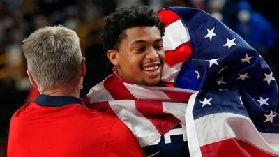 United States' Keldon Johnson (4), right, celebrates with assistant coach Steve Kerr after their win in the men's basketball gold medal game against France at the 2020 Summer Olympics, Saturday, Aug. 7, 2021, in Saitama, Japan. (AP Photo/Eric Gay) (AP) United States' Keldon Johnson (4), right, celebrates with assistant coach Steve Kerr after their win in the men's basketball gold medal game against France at the 2020 Summer Olympics, Saturday, Aug. 7, 2021, in Saitama, Japan. (AP Photo/Eric Gay) (AP)