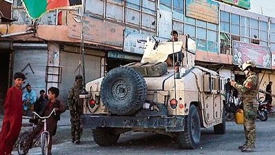 Afghan special forces patrol the streets of Herat as the Taliban continue a series of offensives against urban areas in Afghanistan. (AFP) Afghan special forces patrol the streets of Herat as the Taliban continue a series of offensives against urban areas in Afghanistan. (AFP)