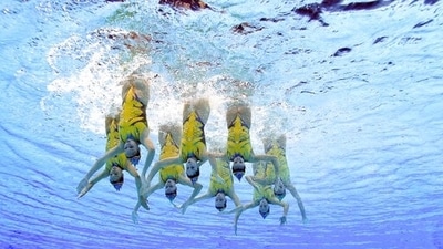The Spain artistic swimming team competes during the team free routine final at the 2020 Summer Olympics, Saturday, Aug. 7, 2021, in Tokyo, Japan. (AP Photo/Jeff Roberson) (AP) The Spain artistic swimming team competes during the team free routine final at the 2020 Summer Olympics, Saturday, Aug. 7, 2021, in Tokyo, Japan. (AP Photo/Jeff Roberson) (AP)