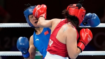 Turkey's Busenaz Surmeneli, right, punches China's Cu Hong during their women's welterweight 69-kg boxing gold medal match at the 2020 Summer Olympics, Saturday, Aug. 7, 2021, in Tokyo, Japan. (AP Photo/Themba Hadebe) (AP) Turkey's Busenaz Surmeneli, right, punches China's Cu Hong during their women's welterweight 69-kg boxing gold medal match at the 2020 Summer Olympics, Saturday, Aug. 7, 2021, in Tokyo, Japan. (AP Photo/Themba Hadebe) (AP)