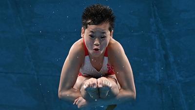 China’s Quan Hongchan competes in the women’s 10m platform diving final event during the Tokyo 2020 Olympic Games at the aquatics centre in Tokyo on Thursday. (AFP) China’s Quan Hongchan competes in the women’s 10m platform diving final event during the Tokyo 2020 Olympic Games at the aquatics centre in Tokyo on Thursday. (AFP)