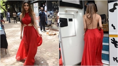 Mouni was snapped on the sets of a shoot today in Mumbai. She chose a bright red floor-length gown and looked jaw-droppingly stunning. (Varinder Chawla) Mouni was snapped on the sets of a shoot today in Mumbai. She chose a bright red floor-length gown and looked jaw-droppingly stunning. (Varinder Chawla)