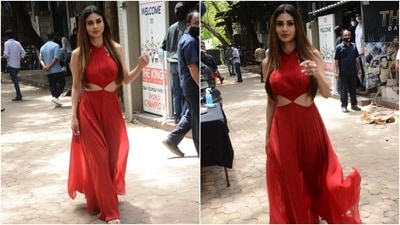 The halter-neck dress came with a fitted bodice and flared sheer tulle skirt, which gave a dreamy vibe to Mouni's look. The backless gown also featured side cut-out details. (Varinder Chawla) The halter-neck dress came with a fitted bodice and flared sheer tulle skirt, which gave a dreamy vibe to Mouni's look. The backless gown also featured side cut-out details. (Varinder Chawla)