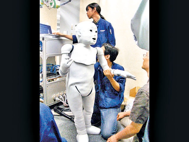 CB2 is a childlike bot that responds to sound and touch. Researchers designed it to assist children. (Osaka University) CB2 is a childlike bot that responds to sound and touch. Researchers designed it to assist children. (Osaka University)