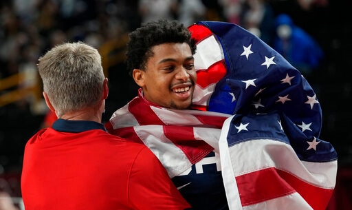 United States' Keldon Johnson (4), right, celebrates with assistant coach Steve Kerr after their win in the men's basketball gold medal game against France at the 2020 Summer Olympics, Saturday, Aug. 7, 2021, in Saitama, Japan. (AP Photo/Eric Gay) United States' Keldon Johnson (4), right, celebrates with assistant coach Steve Kerr after their win in the men's basketball gold medal game against France at the 2020 Summer Olympics, Saturday, Aug. 7, 2021, in Saitama, Japan. (AP Photo/Eric Gay)