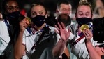 USA athletes show their gold medals during the closing ceremony in the Olympic Stadium at the 2020 Summer Olympics, Sunday, Aug. 8, 2021, in Tokyo, Japan. (AP Photo/Jae C. Hong)(AP) USA athletes show their gold medals during the closing ceremony in the Olympic Stadium at the 2020 Summer Olympics, Sunday, Aug. 8, 2021, in Tokyo, Japan. (AP Photo/Jae C. Hong)(AP)