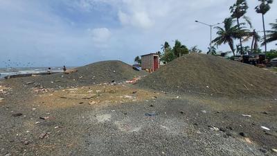 construction material dumped on fish drying area at Chimbai beach, Bandra. (HT ) construction material dumped on fish drying area at Chimbai beach, Bandra. (HT )