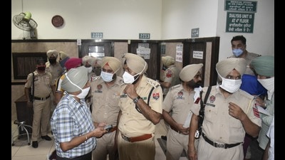 Police at a private hospital in Amritsar where the firing took place on August 3. Police at a private hospital in Amritsar where the firing took place on August 3.
