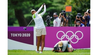 Aditi Ashok watches her drive from the 11th tee in round 4 of the women’s golf individual stroke play during the Tokyo 2020 Olympic Games at the Kasumigaseki Country Club in Kawagoe on August 7. Aditi Ashok captured the imagination of the entire country as sports lovers turned on their tv sets in the wee hours to watch golf. Ranked 200 in the world, the 23-year-old from Bengaluru competed toe-to-toe against the best golfers in the world to finish a credible fourth. (Yoshi Iwamoto / AFP) Aditi Ashok watches her drive from the 11th tee in round 4 of the women’s golf individual stroke play during the Tokyo 2020 Olympic Games at the Kasumigaseki Country Club in Kawagoe on August 7. Aditi Ashok captured the imagination of the entire country as sports lovers turned on their tv sets in the wee hours to watch golf. Ranked 200 in the world, the 23-year-old from Bengaluru competed toe-to-toe against the best golfers in the world to finish a credible fourth. (Yoshi Iwamoto / AFP)