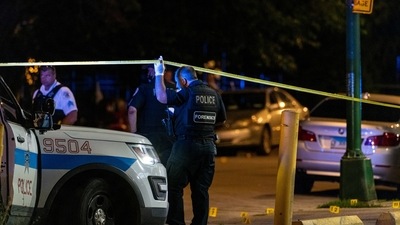 Police also said two suspects were taken into custody, (AP) (AP) Police also said two suspects were taken into custody, (AP) (AP)
