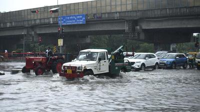 Vehicles wade through a waterlogged stretch at Maharana Pratap Chowk near MDI institute on Sunday evening. (Parveen Kumar/HT Photo) Vehicles wade through a waterlogged stretch at Maharana Pratap Chowk near MDI institute on Sunday evening. (Parveen Kumar/HT Photo)