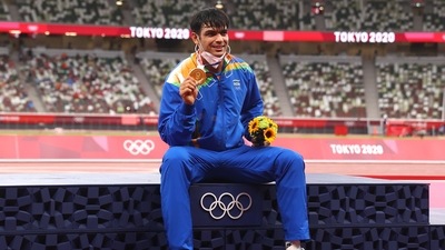 Tokyo 2020 Olympics- Gold medallist Neeraj Chopra of India reacts on the podium. (REUTERS)