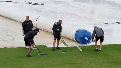 General view of ground staff during rain delay Action Images via Reuters/Paul Childs (Action Images via Reuters)
