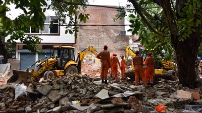 The building which collapsed had shops on the ground floor. One person was pulled out from the rubble by people and another was rescued by Delhi Fire Services officials, DFS Director Atul Garg said. (Sanchit Khanna/Hindustan Times) The building which collapsed had shops on the ground floor. One person was pulled out from the rubble by people and another was rescued by Delhi Fire Services officials, DFS Director Atul Garg said. (Sanchit Khanna/Hindustan Times)