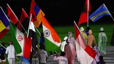 Bronze medalist Bajrang Punia holds the Indian flag at the Olympics Stadium during the closing ceremony of the Tokyo Olympic 2020, in Tokyo on Sunday. (ANI Photo) 