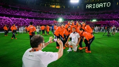 Athletes of Japan pose during the closing ceremony in the Olympic Stadium at the 2020 Summer Olympics, Sunday, Aug. 8, 2021, in Tokyo, Japan. (Dan Mullen/Pool Photo via AP)) (AP)